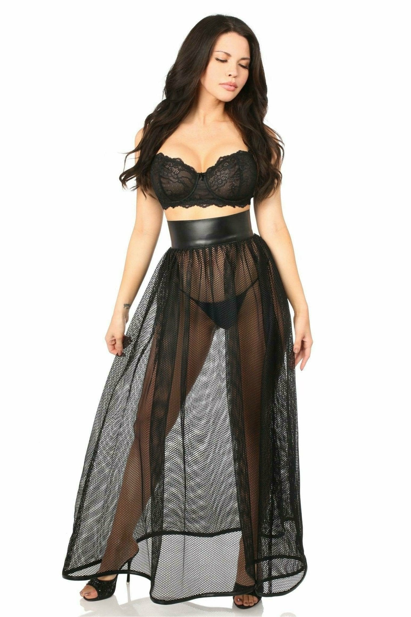 A woman models the Fishnet & Faux Leather Long Skirt, highlighting the faux leather waistband and fishnet detail, emphasizing its chic design.
