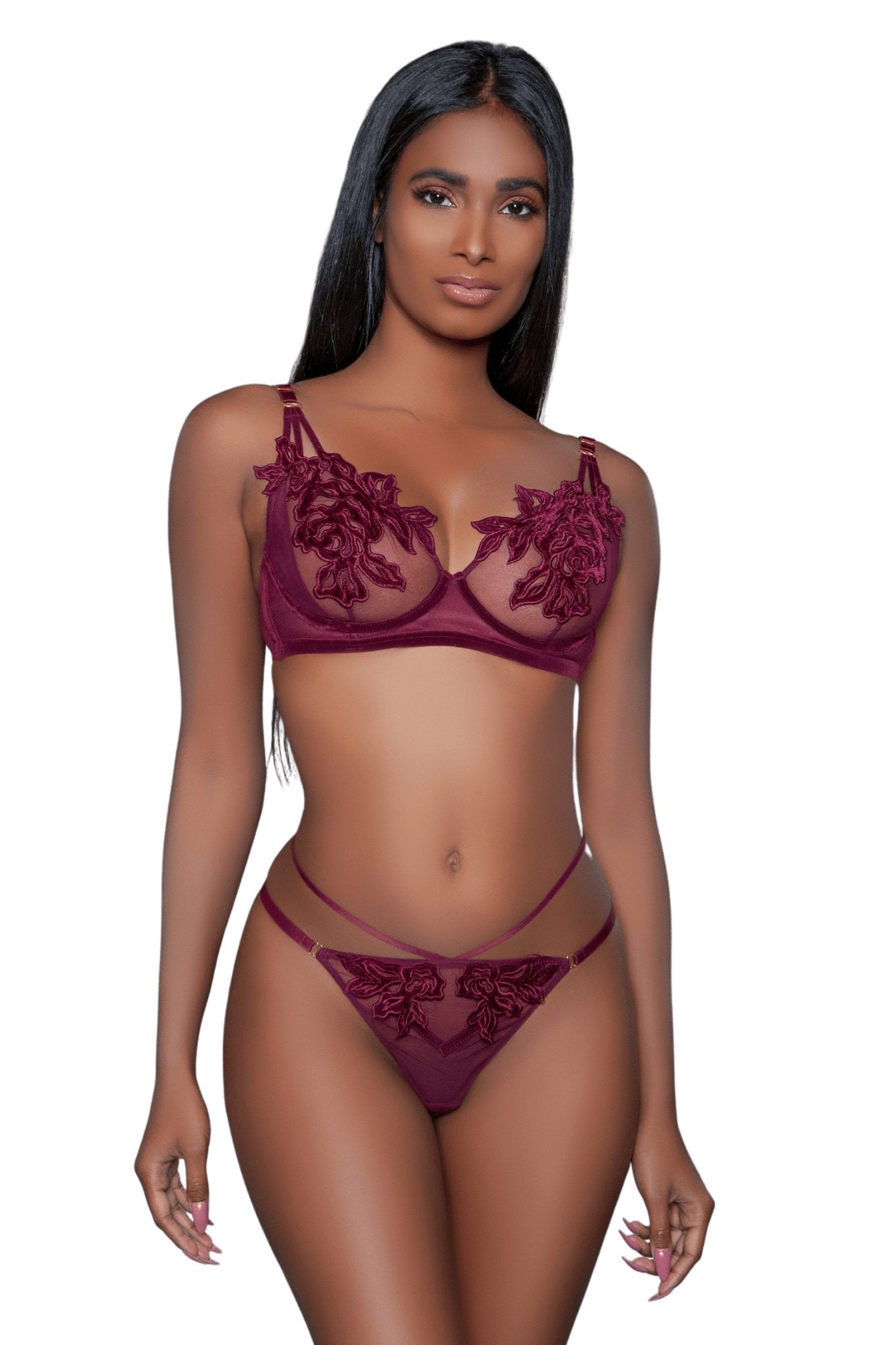 Lace Floral Lingerie Set featuring a sheer mesh bra with floral appliqué and matching multiple-strap thong, modeled by a woman with long black hair.