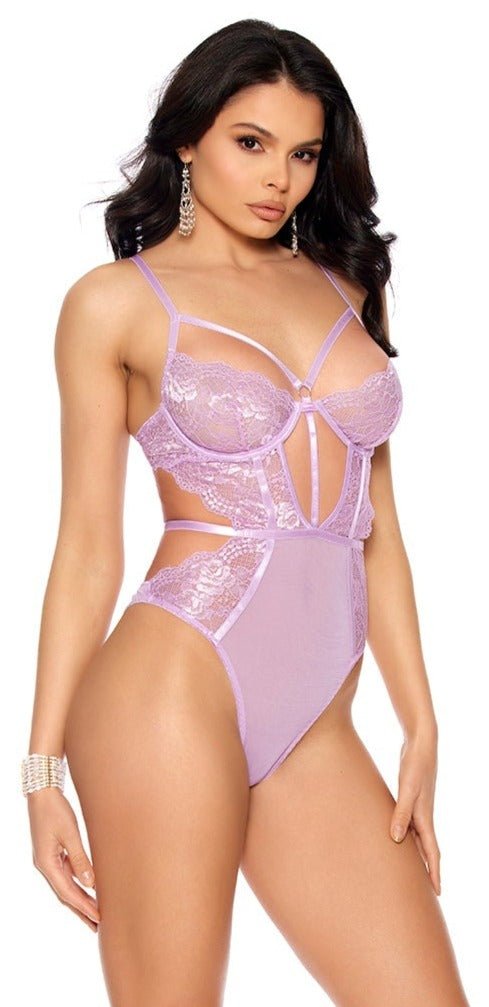 Woman modeling Provocative Cutout Elegance Underwire Teddy featuring lace and mesh design with strappy front, cut-out sides, adjustable straps, and hook and eye back closure.