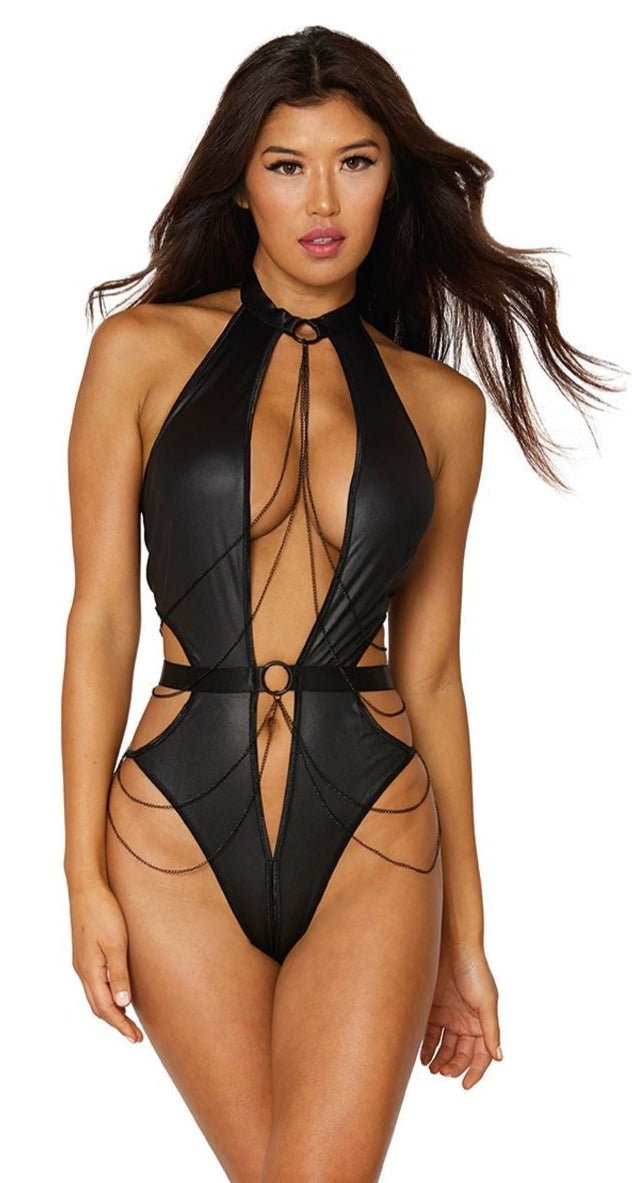 Woman modeling the Sexy Cut Out One Piece Chain Teddy, featuring daring cutouts, ring details, and chain accents, with an open back and G-string coverage.