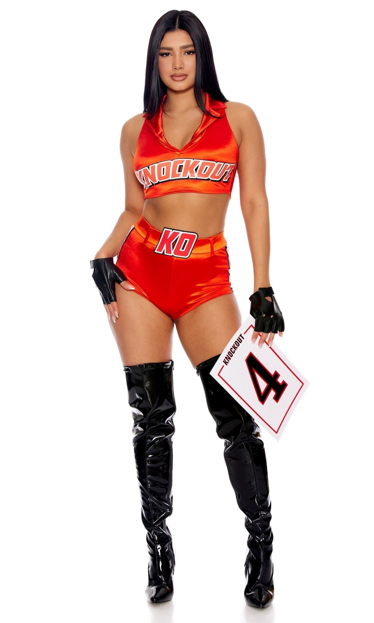 Woman modeling the Sexy Enter The Ring Halloween Costume, featuring a collared crop top, matching shorts, KO belt, and fingerless gloves.