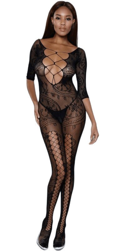 Woman modeling the Sexy Fire and Desire Lace Bodystocking with a figure-flattering floral criss-cross design, showcasing elegance and sophistication. Thong not included.