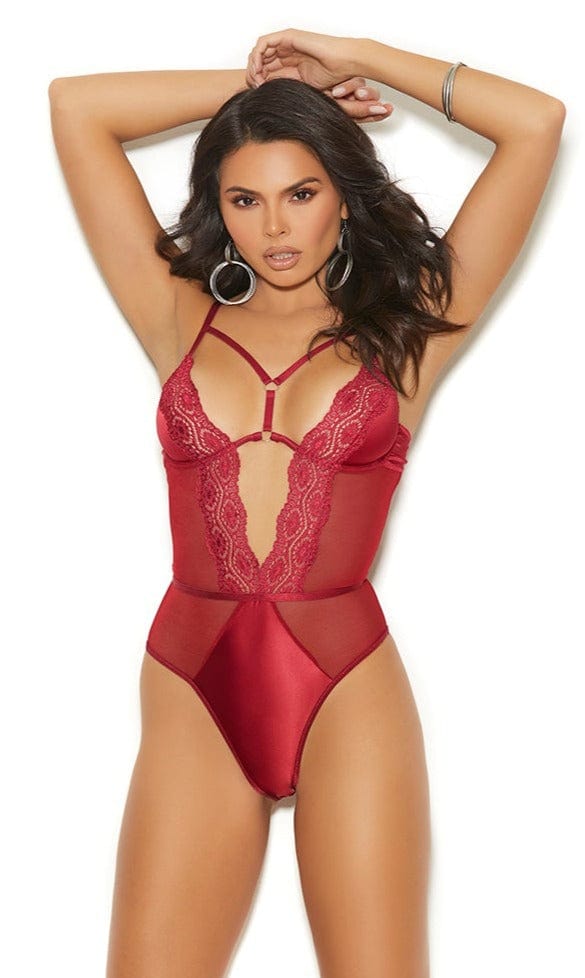 Woman modeling the Sexy Flex Mesh, Satin and Lace Teddy, showcasing strappy front detail, adjustable straps, and underwire design in a fashion shoot setting.