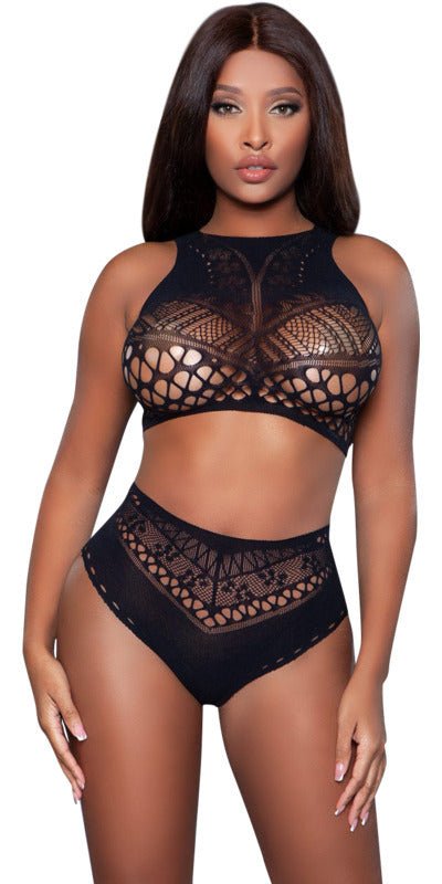 Sexy Laser Cut Ring My Bell Set featuring a model in a sheer halter neck crop top with cross-back design bottom, showcasing its chic, breathable style.