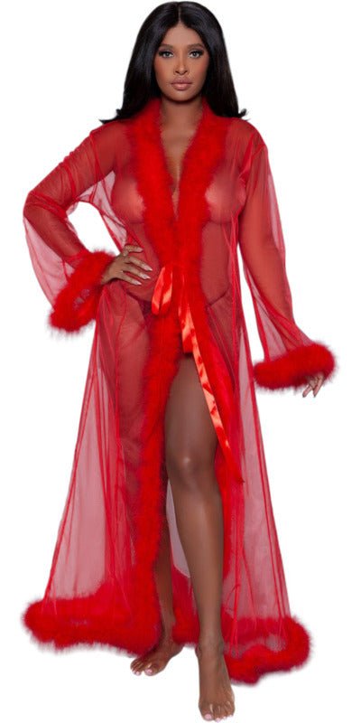 Woman wearing the Sexy Long Marabou Robe in Red, featuring sheer fabric and luxurious marabou feather trim, designed to complement lingerie.