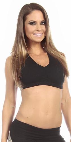 Woman wearing Sexy Military Force Supportive Green Digital Camouflage Sports Bra Top - Black/Green with scrunch front, racer back, and military camo accents, smiling.