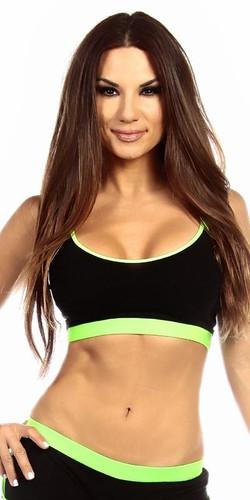 Woman modeling the Sexy Neon Trim Fit Principle Athletic Crop Sports Bra Top, showcasing its sleek fit and stylish black with neon green trim design.