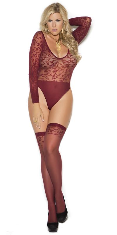Woman wearing the Sexy Plus Size Vibe Burgundy Pattern Teddy with Stockings, showcasing a sheer mesh bodysuit with high cut legs and matching thigh-high stockings.